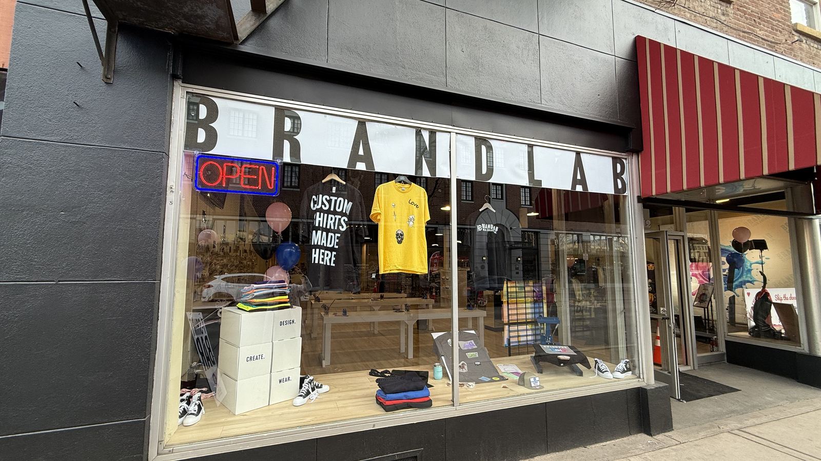 The BRANDLAB storefront on SW 6th Street in downtown Redmond, Oregon